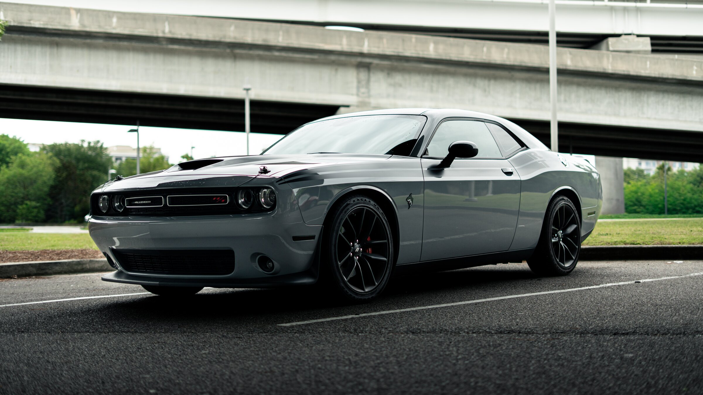 Dodge Challenger R/T parked under an overpass